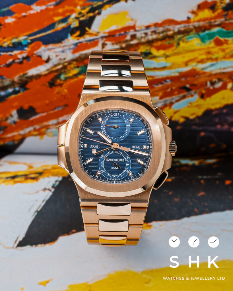 Patek Philippe Nautilus 5990/1R-001 Travel Time Flyback Chronograph Rose Gold Blue Dial