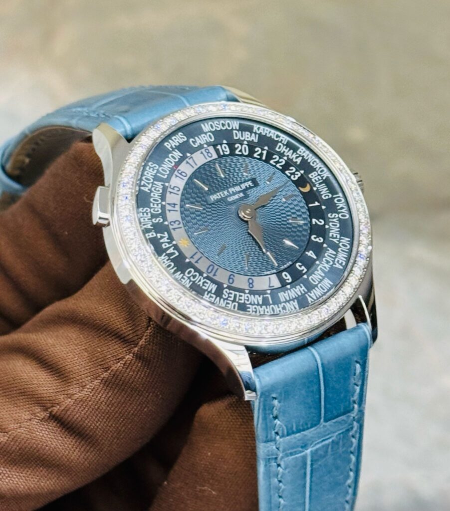 Patek Philippe Complications 7130G-016 World Time l White Gold Gray-Blue Dial Diamond Bezel