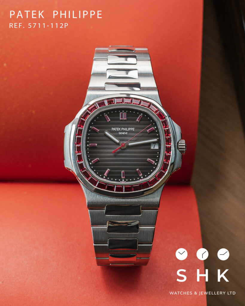 Patek Philippe Nautilus 5711/112P-001 Platinum Grey Dial Ruby Bezel