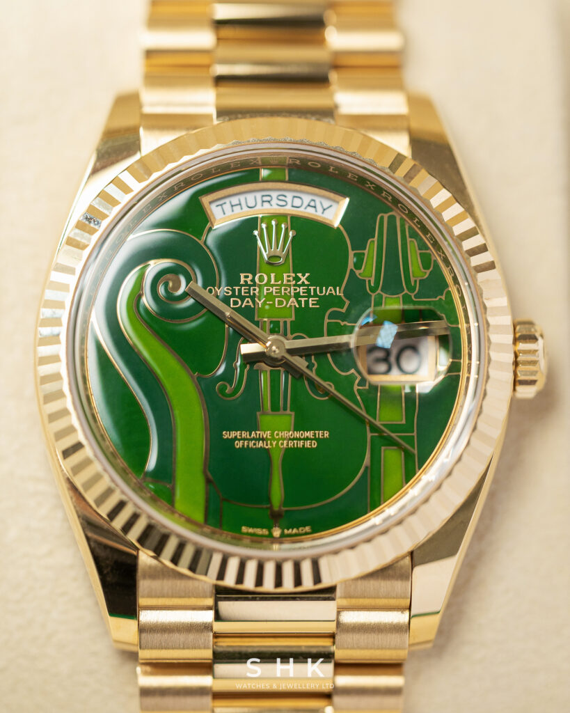 Rolex Day-Date 36 128238 Vienna Philharmonic Violin Dial Yellow Gold